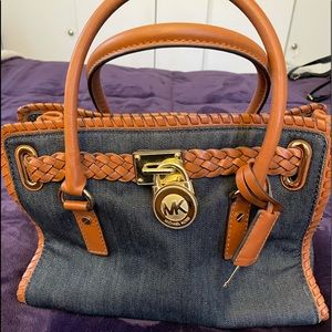 Denim Michael Kors purse. Only used a handful of times. Like new condition.